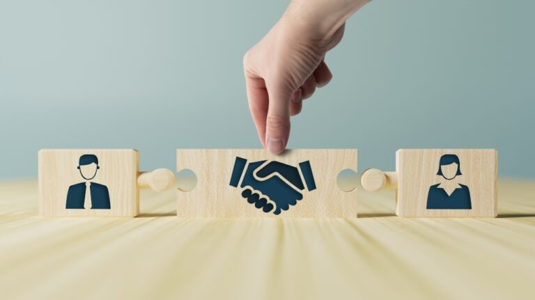 Married couple blocks with a hand block in the middle for mediation