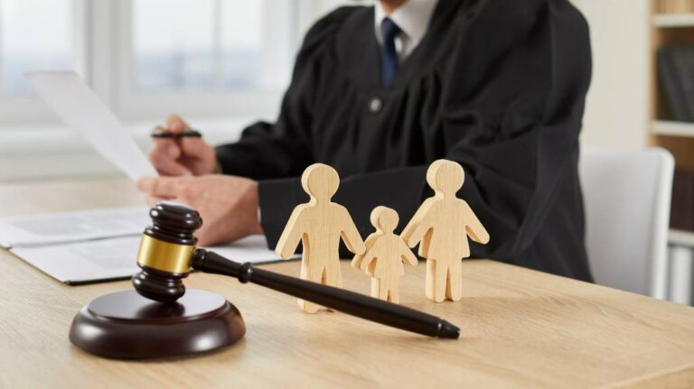 judge with wood cutout of a family