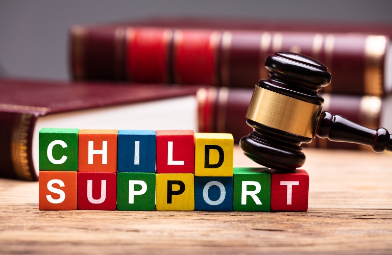 Child Support colorful block with hammer