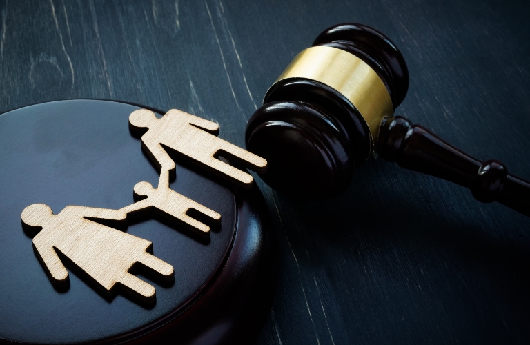 Family figurines and court hammer