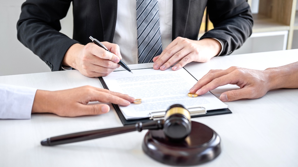 husband and wife during divorce process with male lawyer
