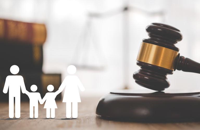 judge gavel with paper model of family with children