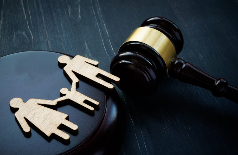 Family figurines and court hammer