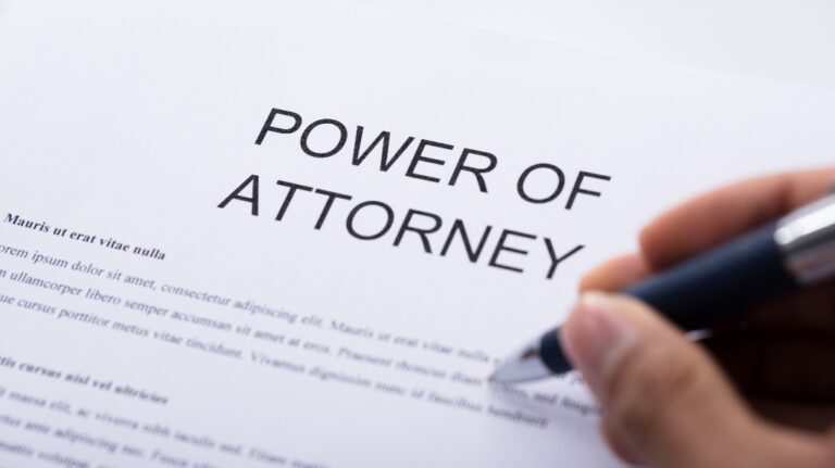 power of attorney document and pen